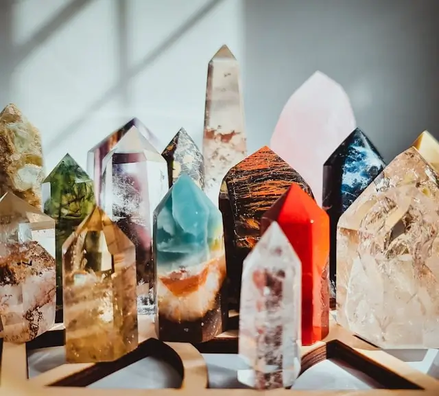 Diverse crystal collection showing various colors and clarity types used for authentic crystal identification and gemstone analysis