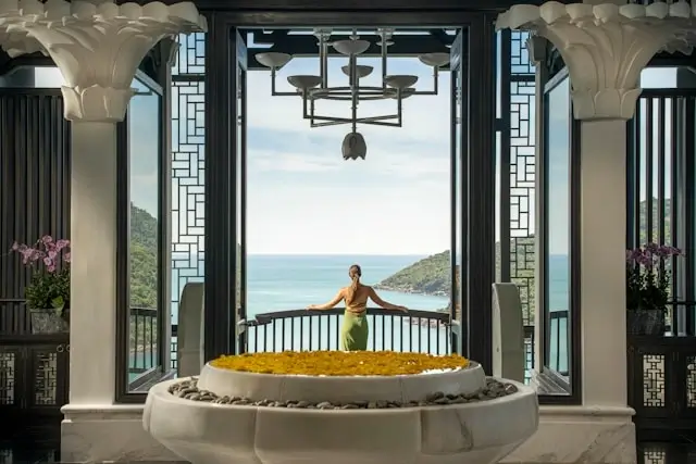 Luxury resort lobby with ocean view and decorative fountain in Da Nang Vietnam during off-peak season