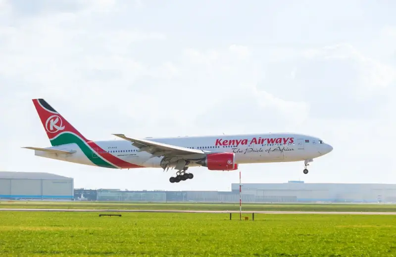 Kenya Airways Boeing 777 aircraft landing at airport runway for travel to Kenya
