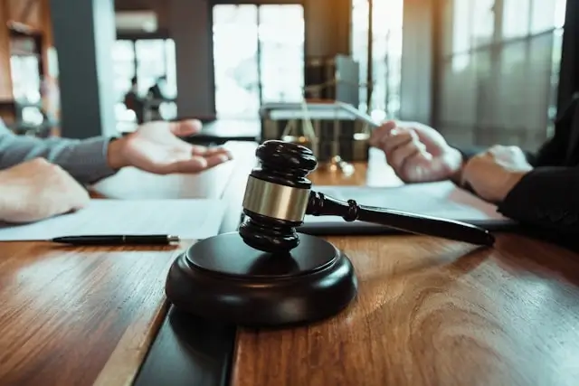 Attorney consultation with gavel on desk for drunk driving victims seeking legal representation