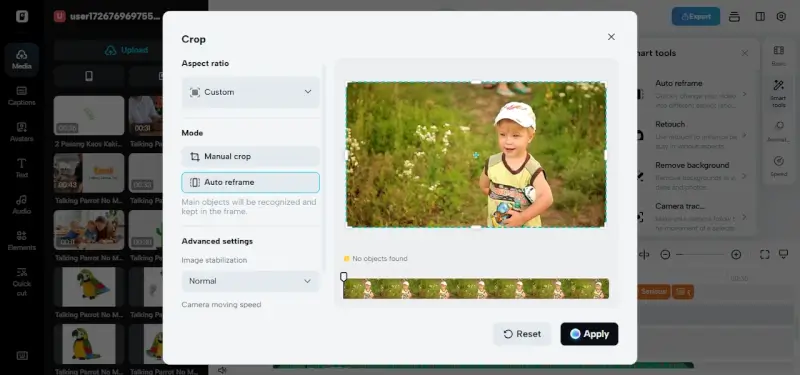 Pippit's Auto reframe crop tool dialog showing a child in a yellow shirt outdoors, with options for aspect ratio selection, manual crop or auto reframe modes, and advanced settings for image stabilization