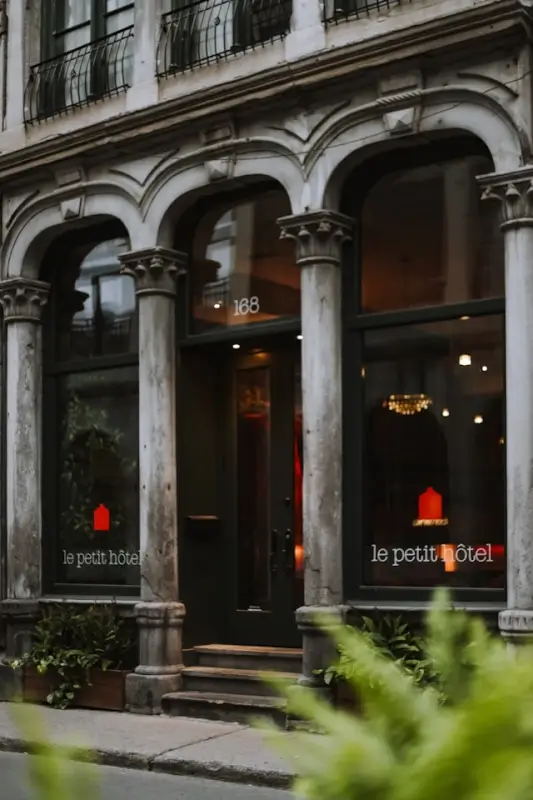 Charming boutique hotel entrance with historic architecture and welcoming ambiance for repeat visitors