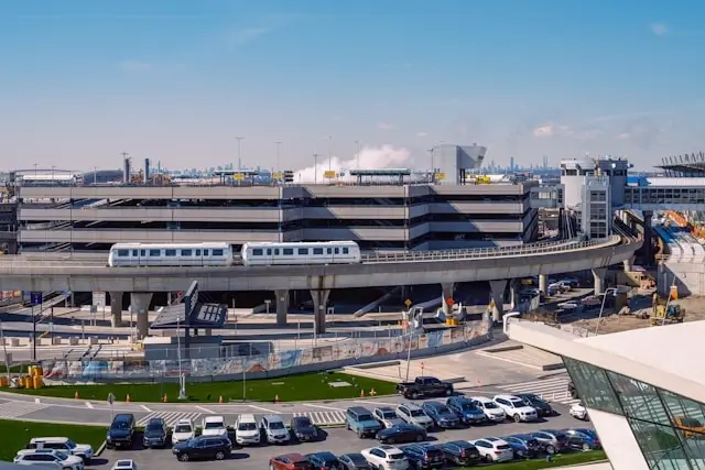 Elevated airport transit system connecting terminals with efficient design infrastructure for seamless traveler movement between transportation hubs