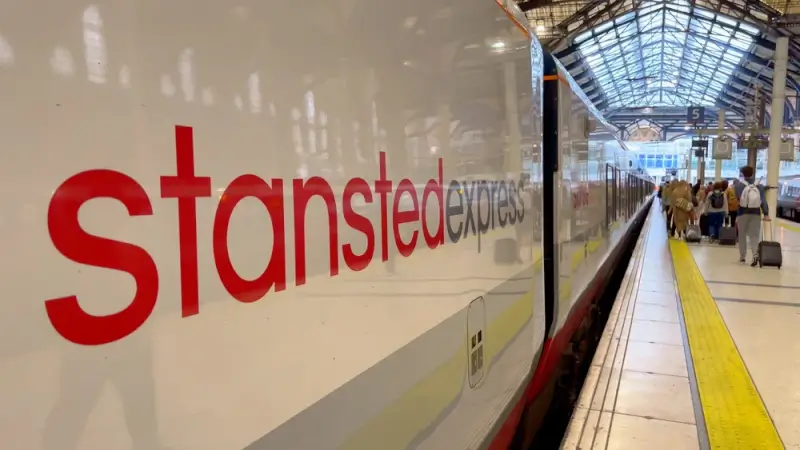 Stansted Express train at platform connecting airport to London Liverpool Street station