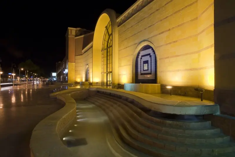 Illuminated fountain and modern architecture in Hurghada streets at night, Red Sea coastal city offering clear skies for totality viewing