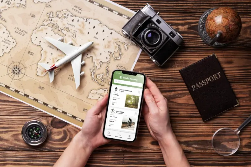 Traveler booking tours and activities on smartphone app for planned travel experiences